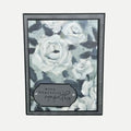 Elegant sympathy card with soft black and white roses, heartfelt message for comfort