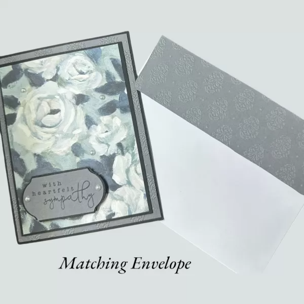 Elegant sympathy card with soft black and white roses, heartfelt message for comfort
