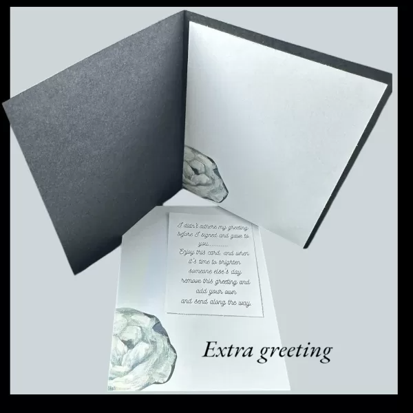 Elegant sympathy card with soft black and white roses, heartfelt message for comfort