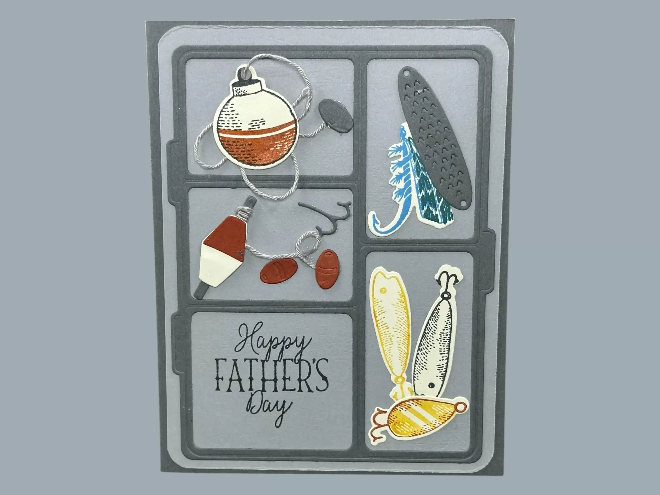 Fun fishing tackle box Father’s Day card with lures, hooks, and bobbers