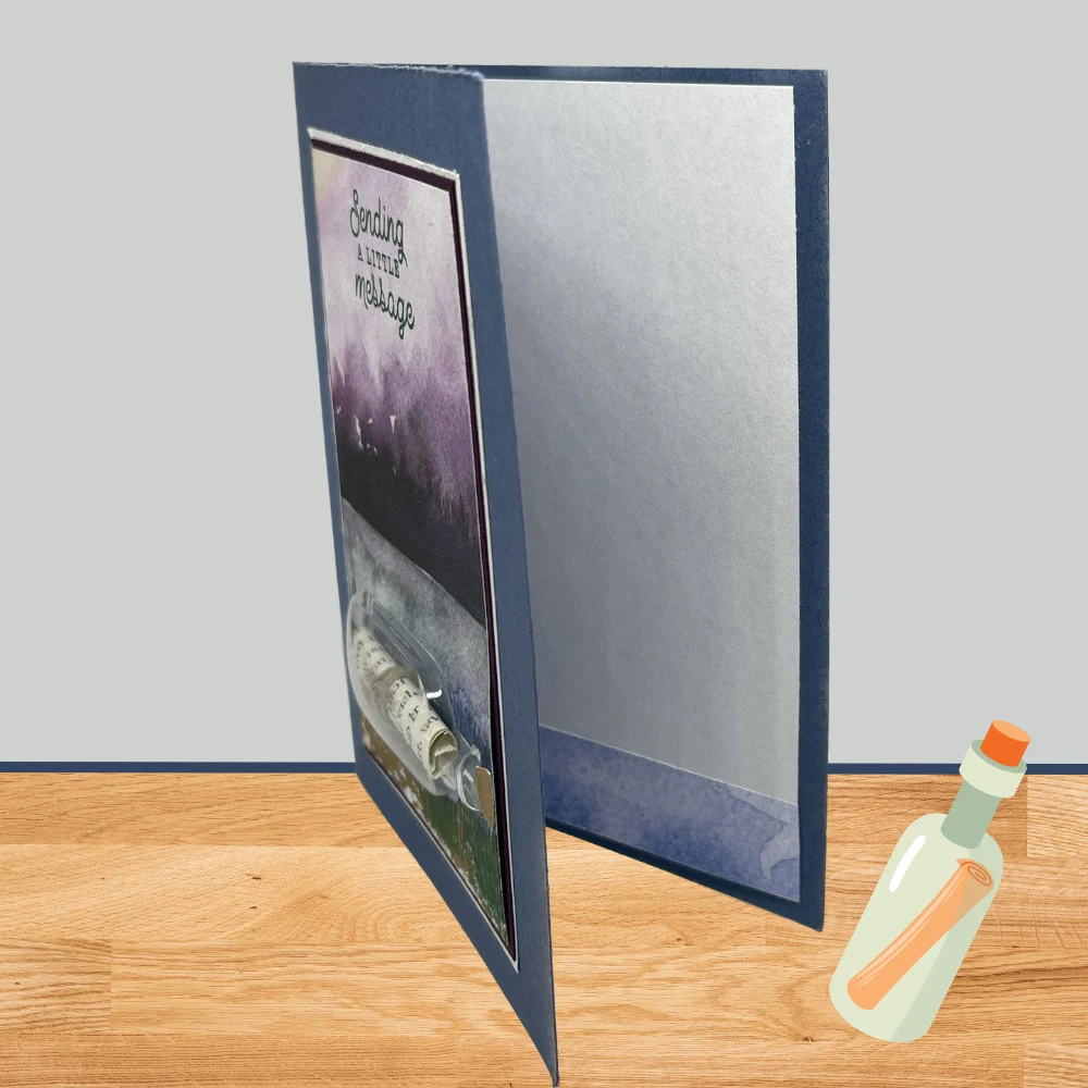 Sending a little message in card that has a 3D message in a bottle. Mountain and lake background