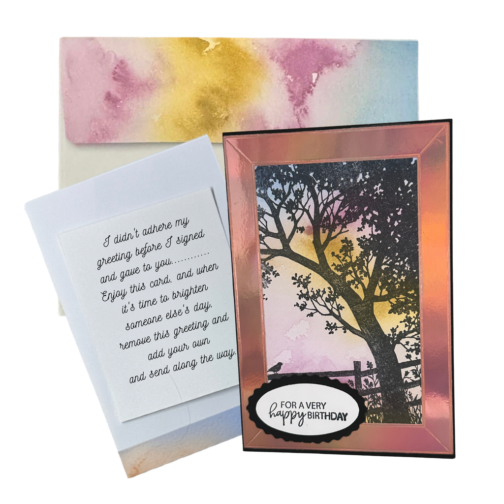 Handmade birthday card displayed with coordinating hand-decorated envelope and bonus extra greeting insert, allowing the card to be shared and enjoyed again.