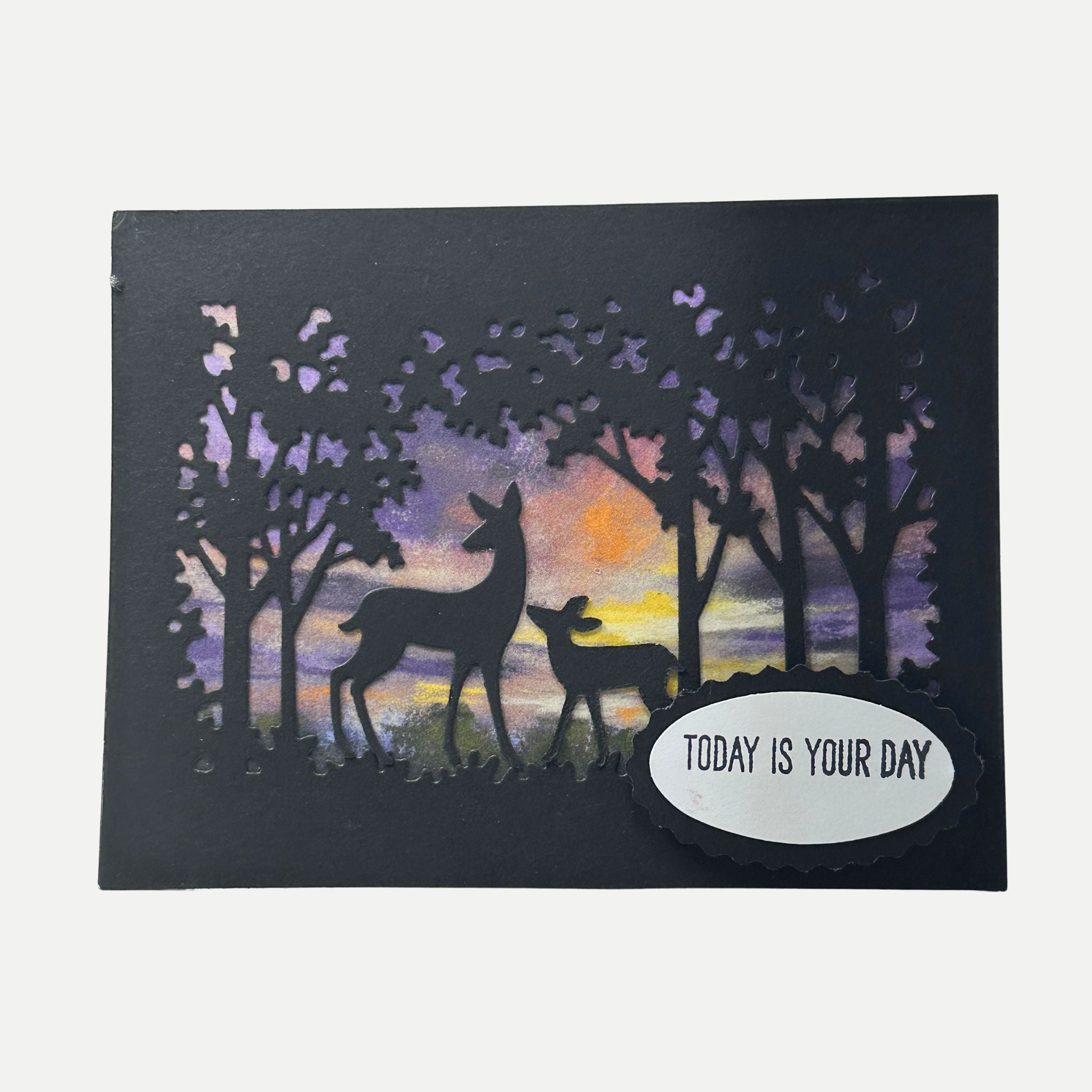 Handmade deer birthday card with woodland scene and sunset background