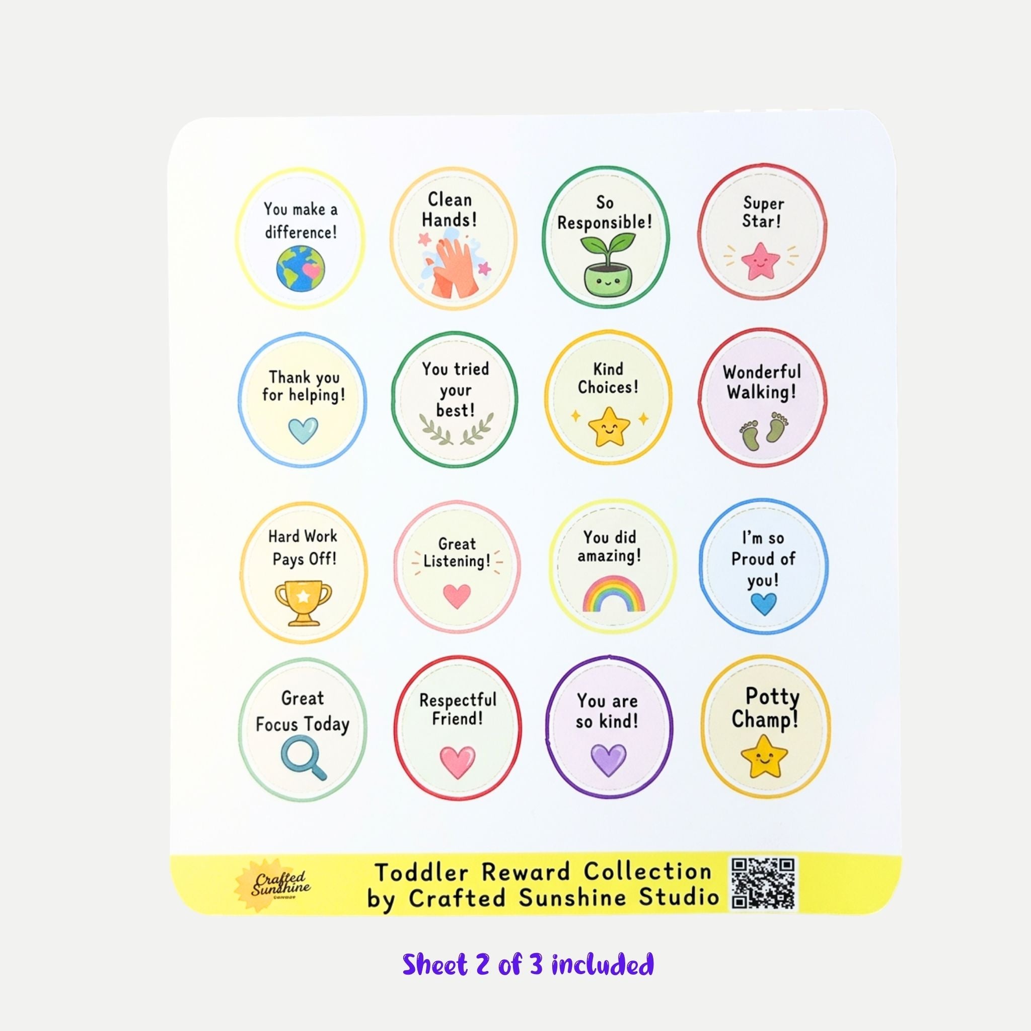 A sheet of toddler reward stickers with colorful pastel borders and positive phrases like 'You make a difference!', 'Clean Hands!', 'So Responsible!', and 'Super Star!', shown on a light background with text noting 'Toddler Reward Collection by Crafted Sunshine Studio'.